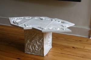 Hand-carved marble table blending traditional Rajasthani motifs with modern minimalist design
